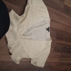 Yellow crop top with white flowers